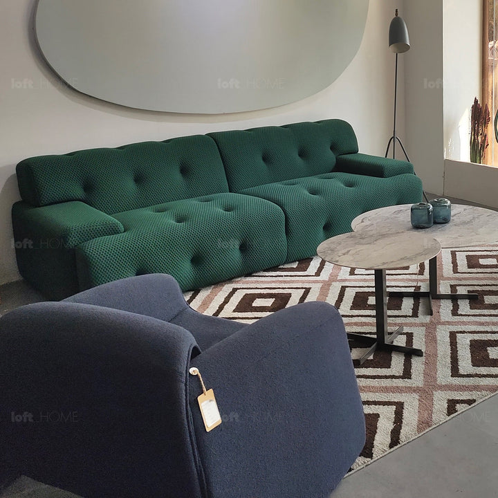 Scandinavian fabric 4 seater sofa blogger in still life.
