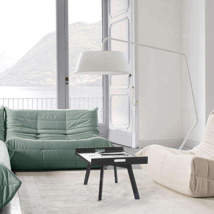 Scandinavian fabric modular 1 seater sofa cater in still life.