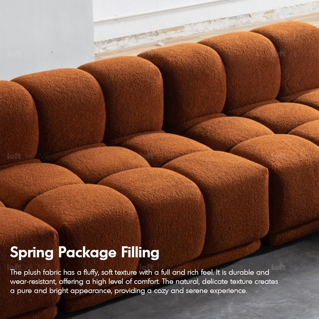 Scandinavian teddy fabric modular 4.5 seater sofa cuboid in close up details.