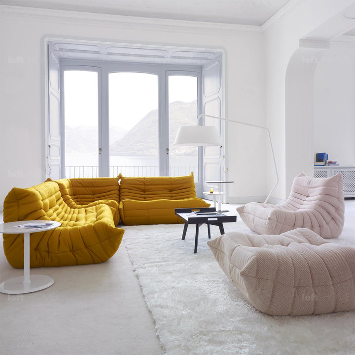 Scandinavian fabric modular corner 1 seater sofa cater in still life.