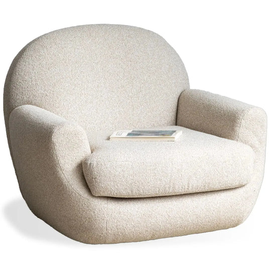 Cream faux cashmere fabric revolving 1 seater sofa rond in white background.