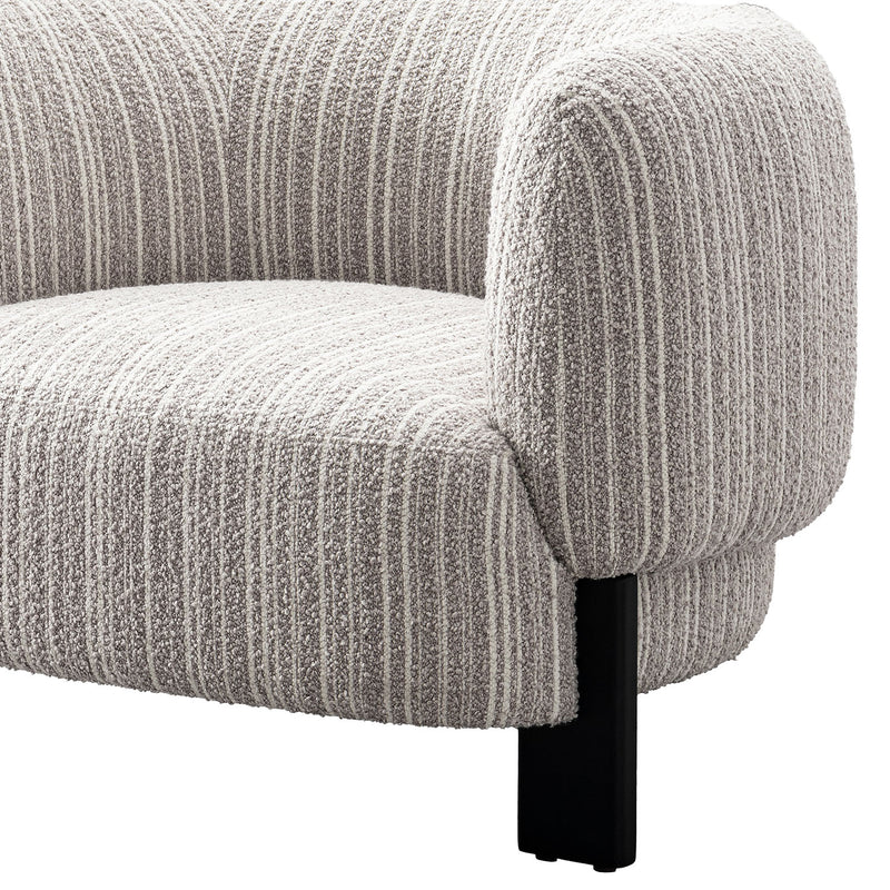 Scandinavian mixed weave fabric 1 seater sofa embrace in close up details.