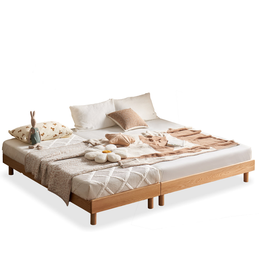 Scandinavian oak wood platform bed grimm in white background.