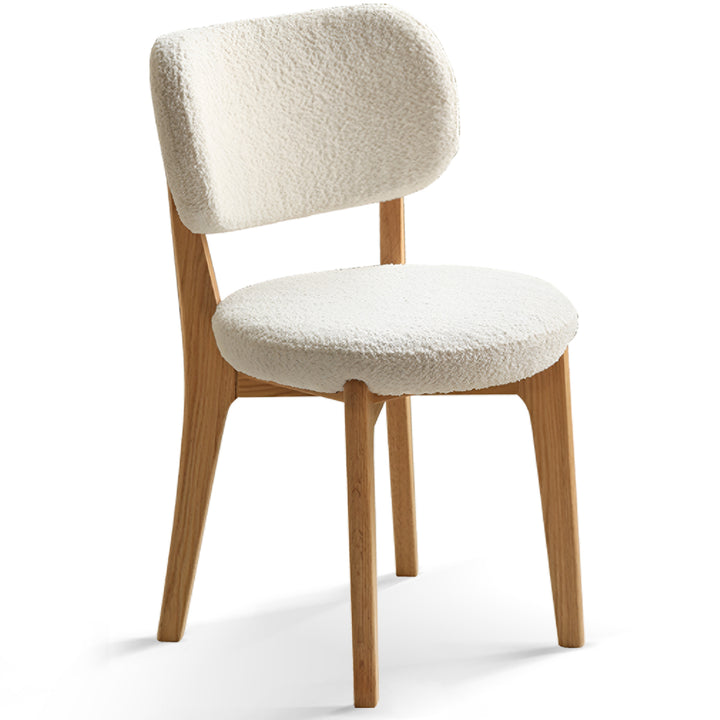 Scandinavian oak wood boucle fabric dining chair cloud in white background.