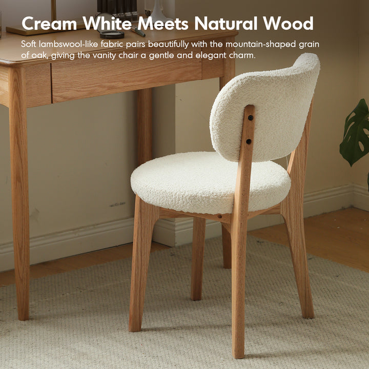 Scandinavian oak wood boucle fabric dining chair cloud in real life style.