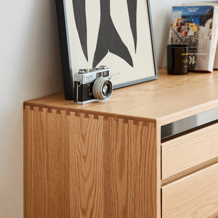 Scandinavian oak wood chest of 6 drawers floating light color swatches.