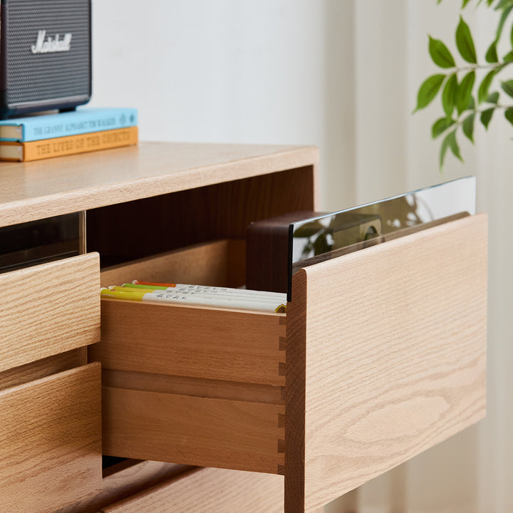Scandinavian oak wood chest of 6 drawers floating light in real life style.