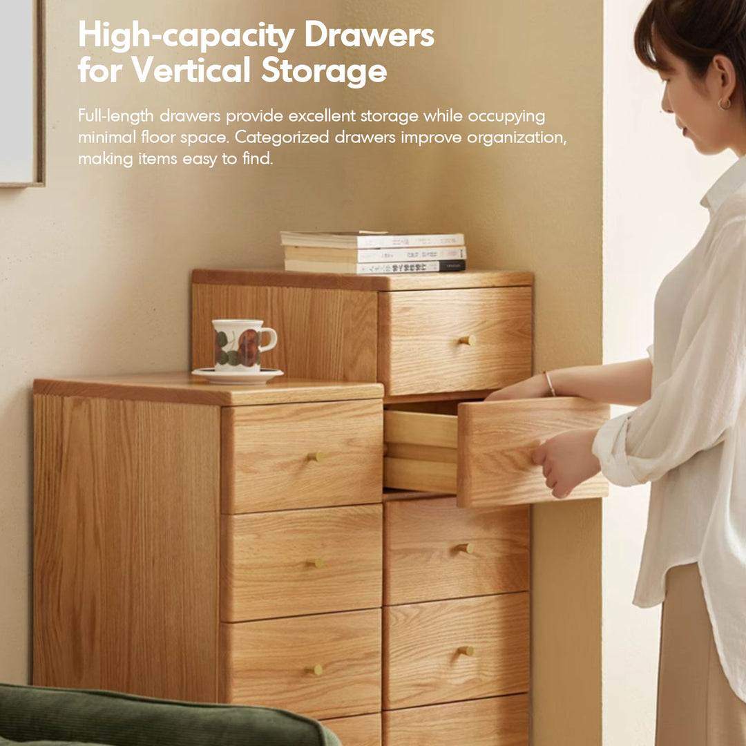 Scandinavian oak wood chest of drawers line in details.