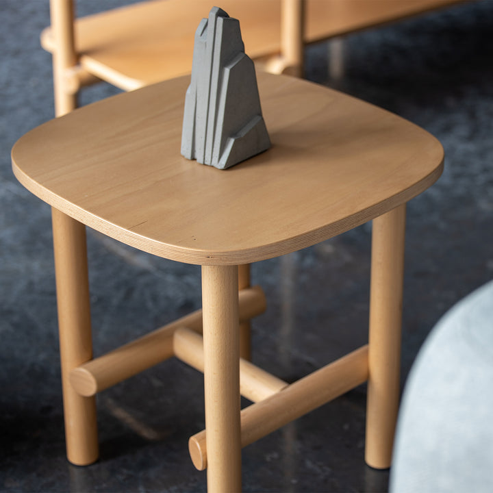 Scandinavian beech wood side table hilda with context.