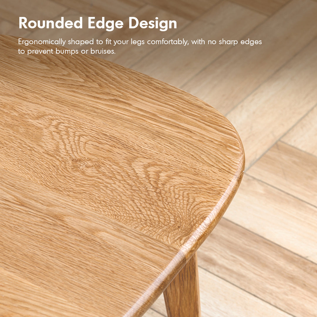 Scandinavian oak wood dining chair elm in close up details.