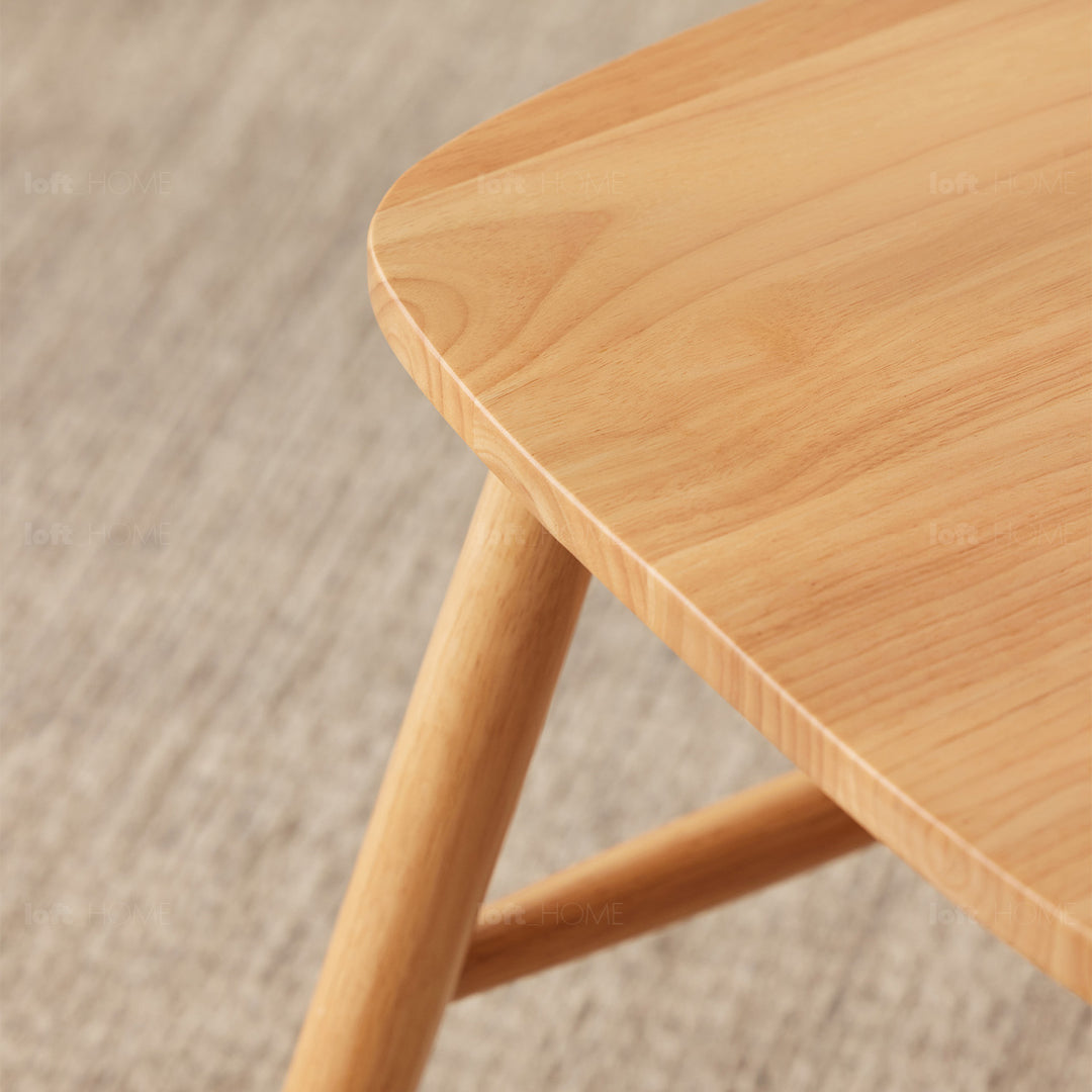 Scandinavian oak wood dining chair windsor in close up details.