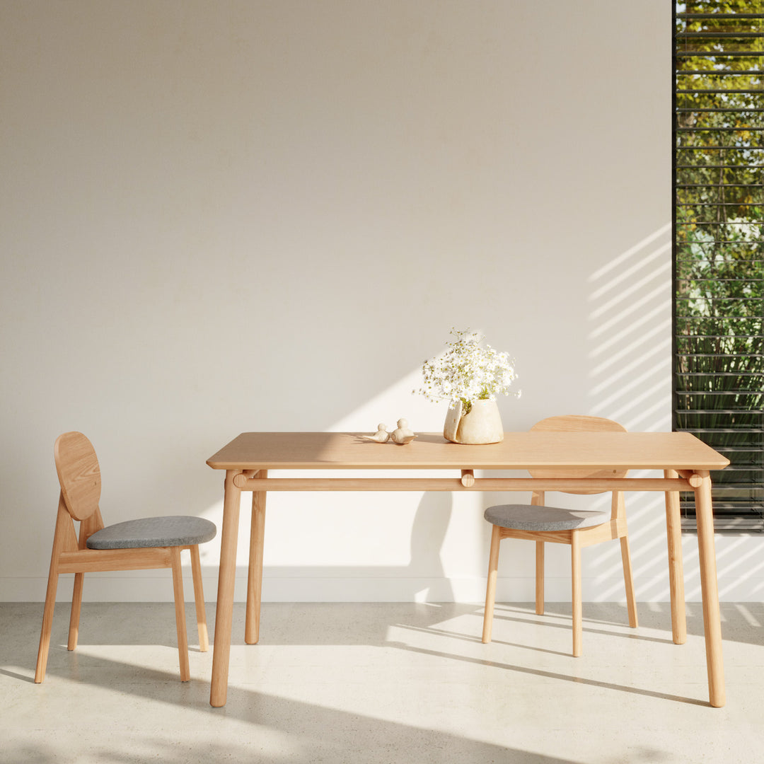 Scandinavian oak wood dining table beem in real life style.