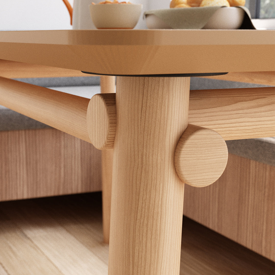 Scandinavian oak wood dining table beem in close up details.