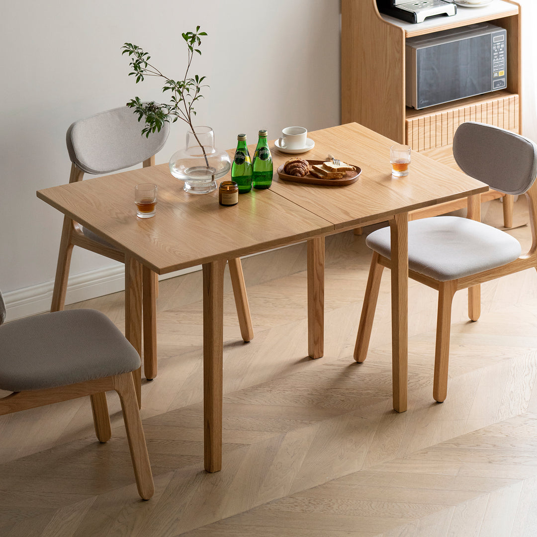 Scandinavian oak wood extendable dining table privot primary product view.