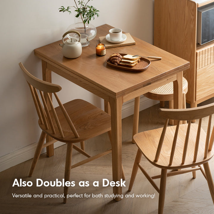 Scandinavian oak wood extendable dining table privot in close up details.