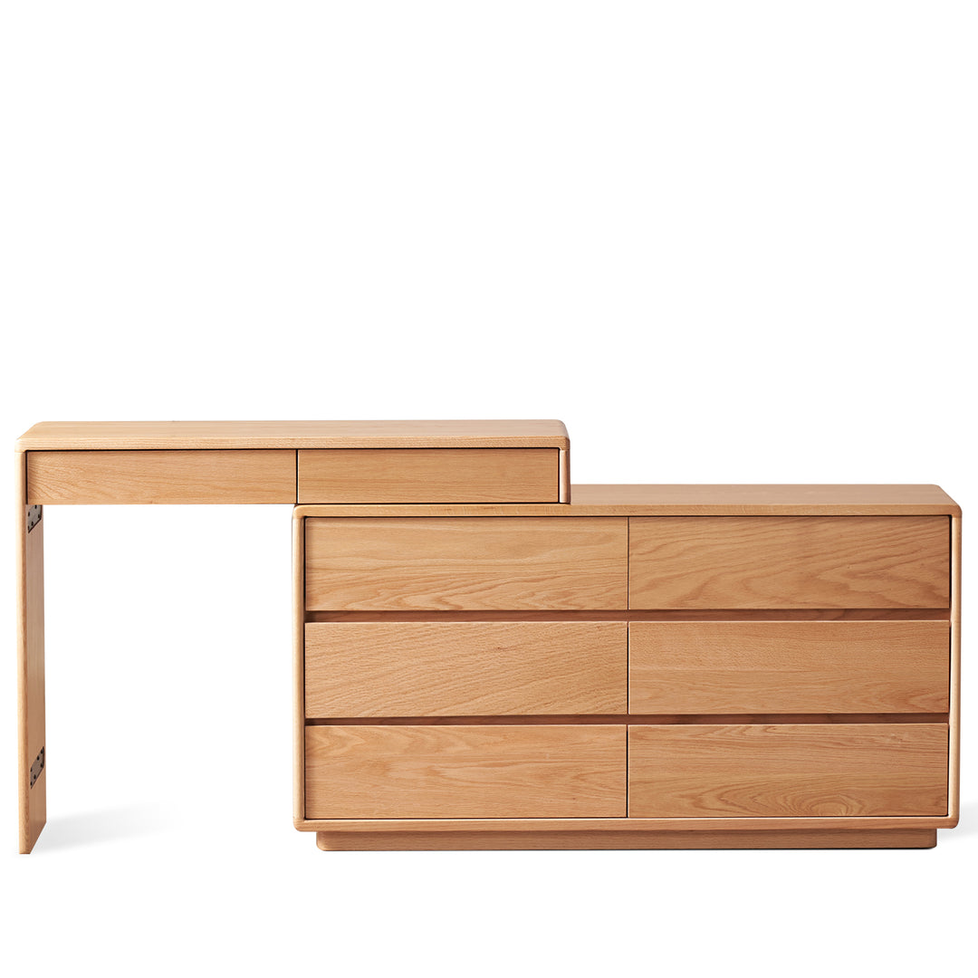 Scandinavian oak wood extendable dressing table with chest of drawers blend in white background.