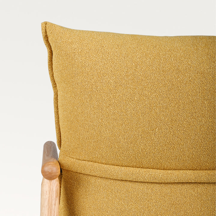 Scandinavian oak wood fabric 1 seater sofa may in still life.