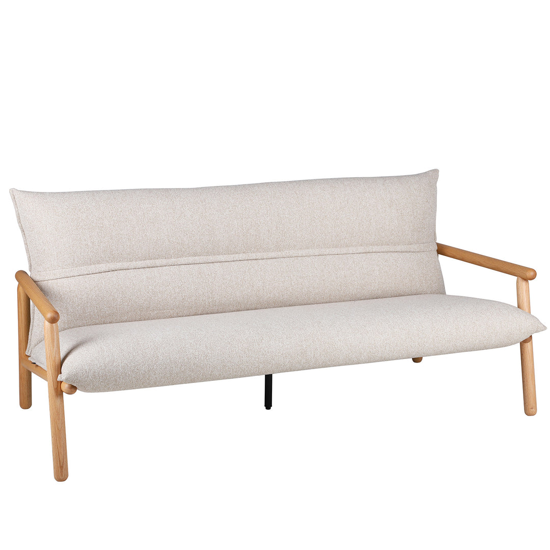 Scandinavian oak wood fabric 2 seater sofa may in still life.