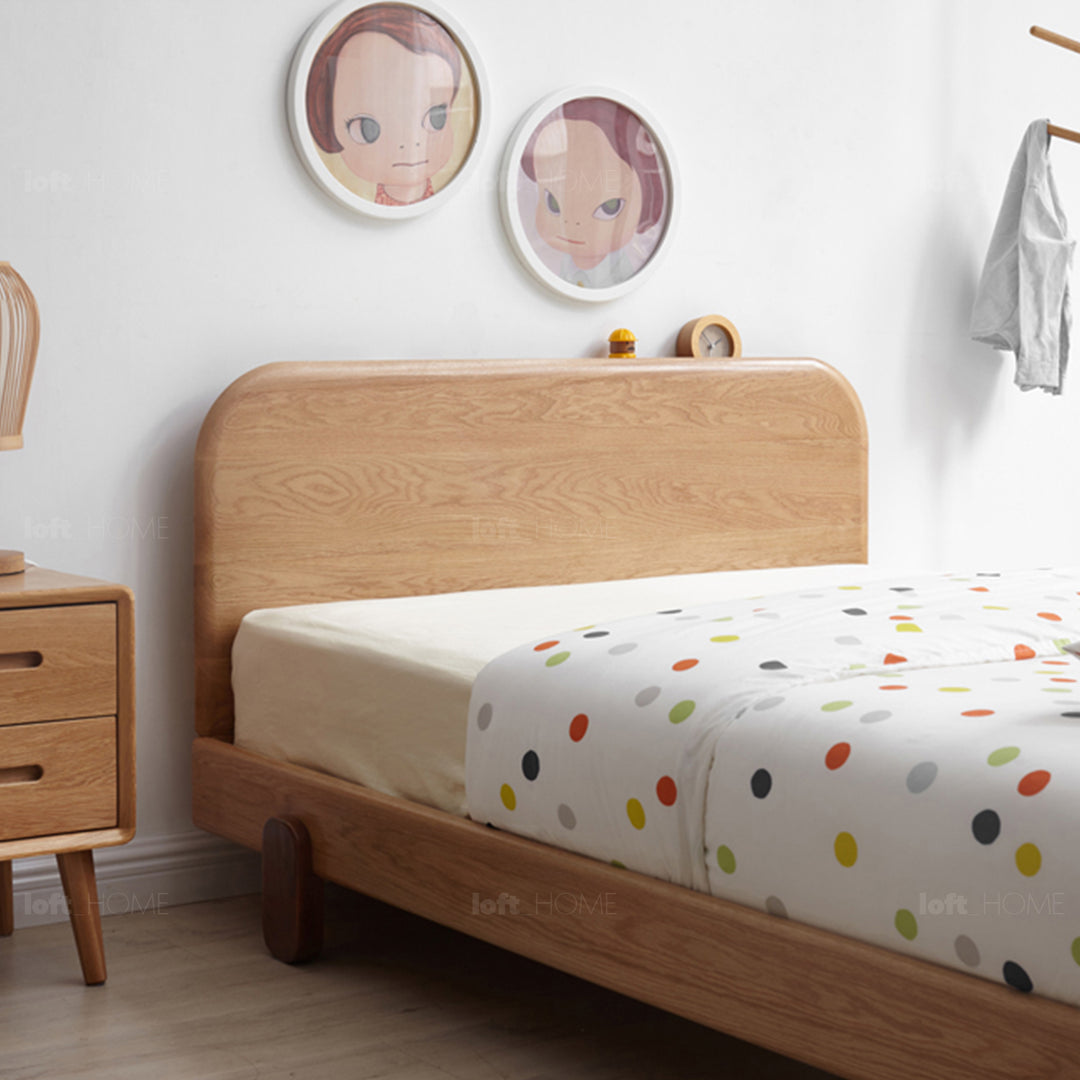 Scandinavian oak wood kids bed peblo in still life.