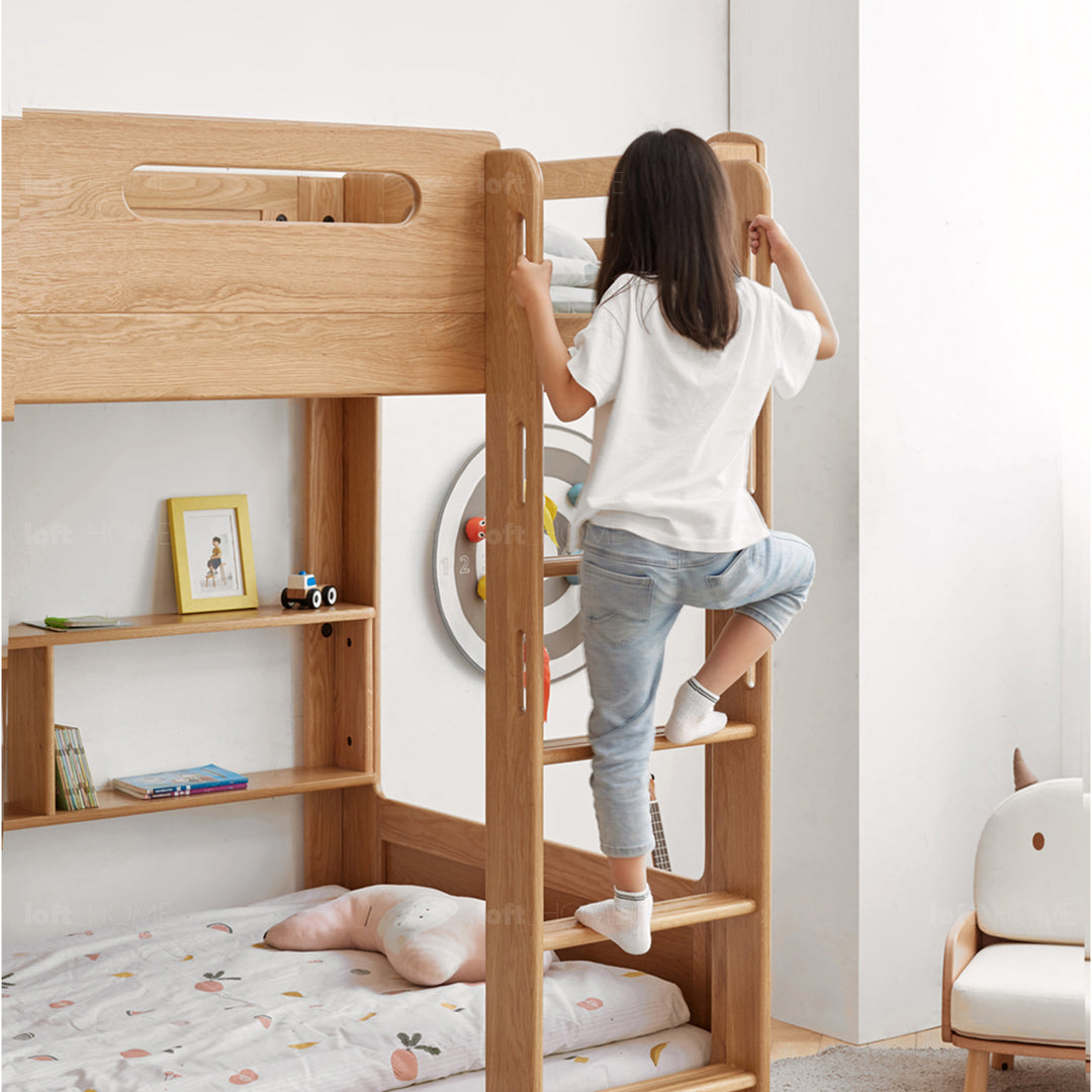 Scandinavian oak wood kids bunk bed with wall shelf hive in still life.