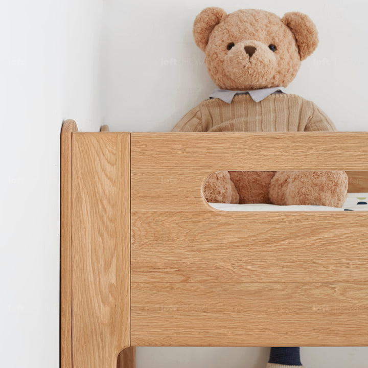 Scandinavian oak wood kids bunk bed with wall shelf hive in details.