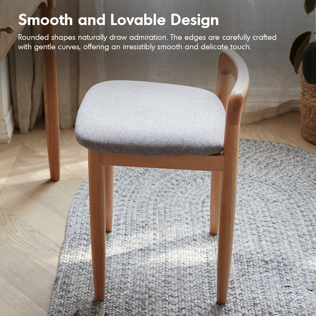 Scandinavian oak wood mixed weave fabric dressing chair loop with context.