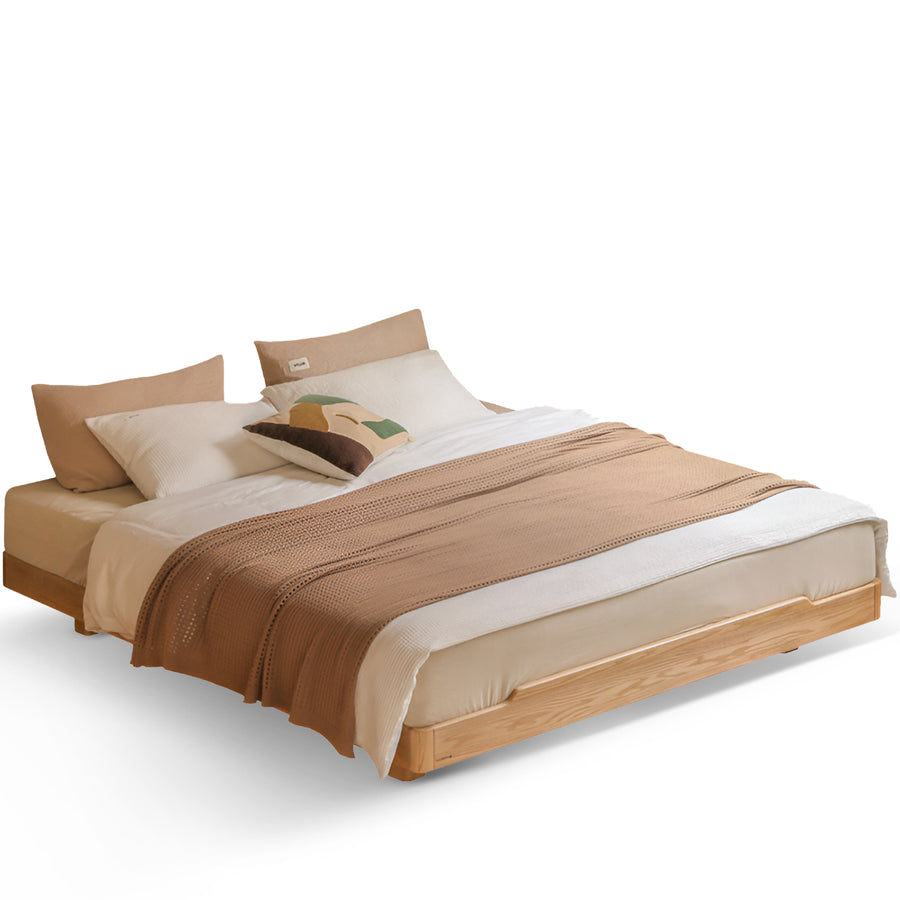 Scandinavian oak wood platform bed eden in white background.