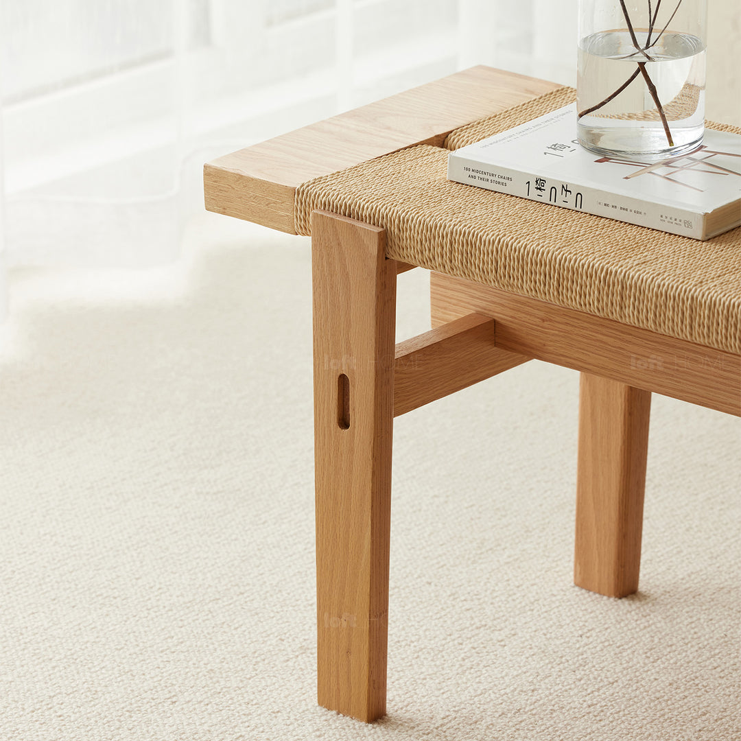 Scandinavian oak wood rope woven bench ora in still life.