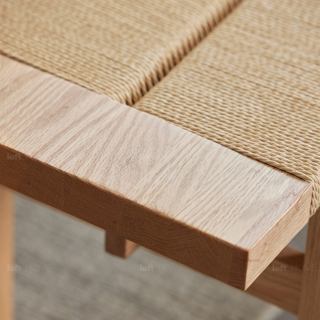 Scandinavian oak wood rope woven bench ora in close up details.