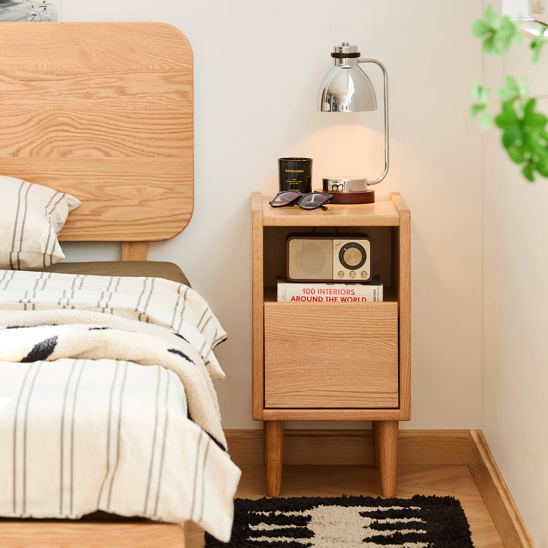 Scandinavian oak wood side table cubo with context.