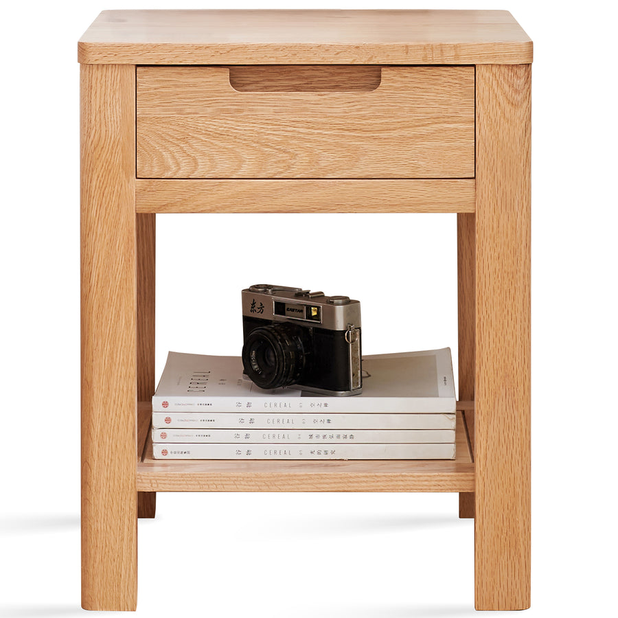 Scandinavian oak wood side table noma in white background.