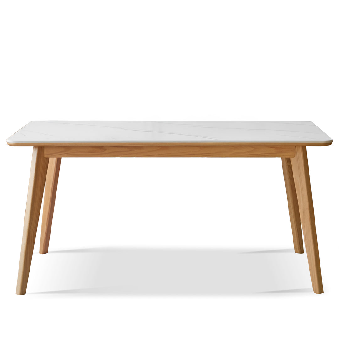 Scandinavian oak wood sintered stone dining table aura in white background.