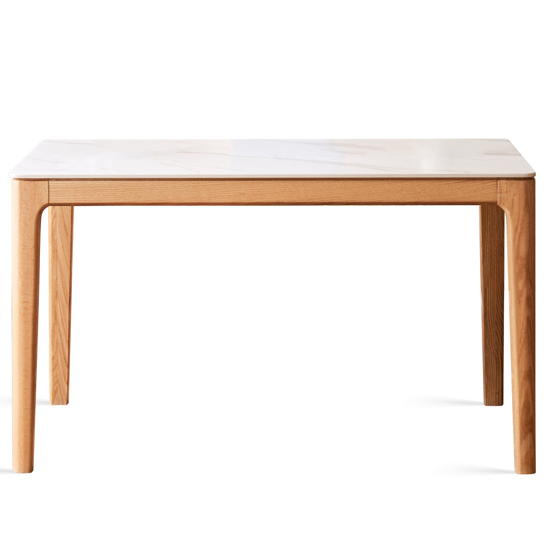 Scandinavian oak wood sintered stone dining table oaklin in white background.