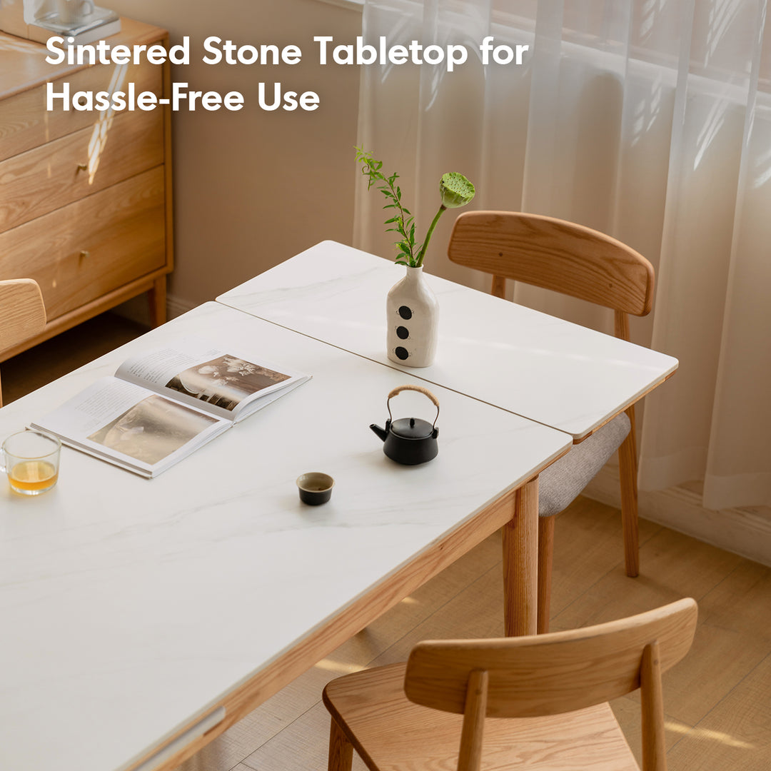 Scandinavian oak wood sintered stone extendable dining table flex in still life.