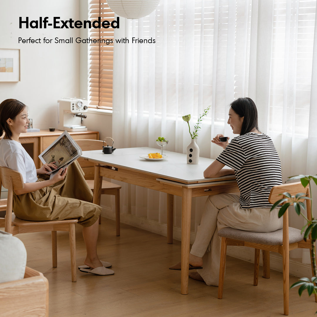 Scandinavian oak wood sintered stone extendable dining table flex in details.