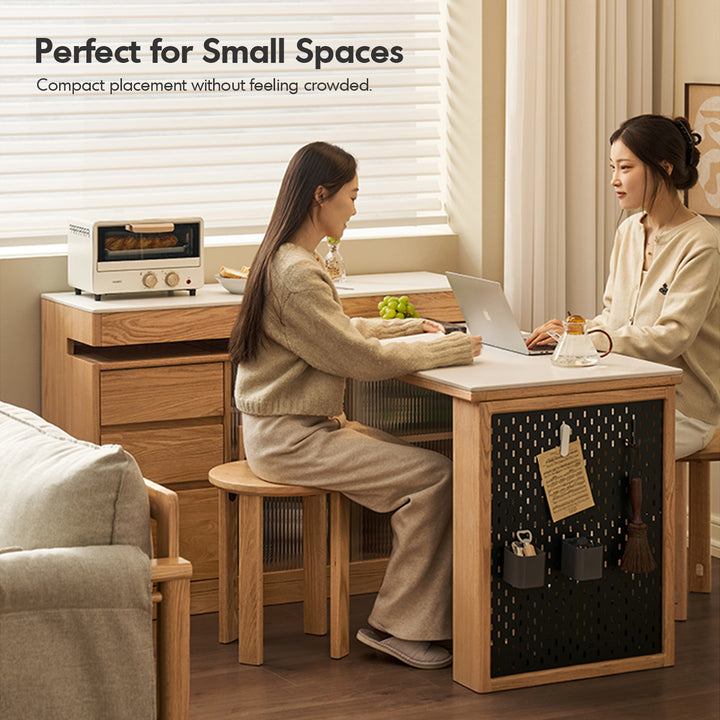 Scandinavian oak wood sintered stone extendable island dining table with cabinet moducab in close up details.