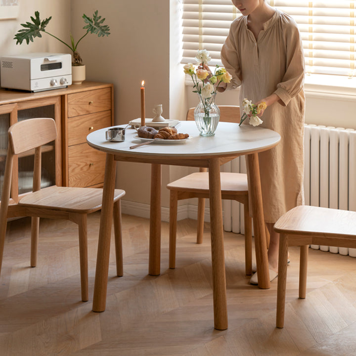 Scandinavian oak wood sintered stone round dining table orb detail 4.