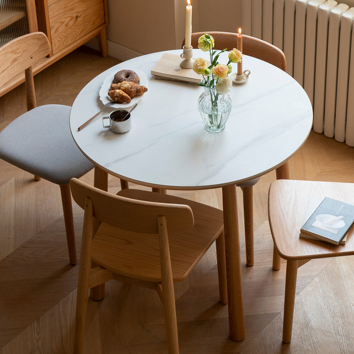 Scandinavian oak wood sintered stone round dining table orb detail 6.