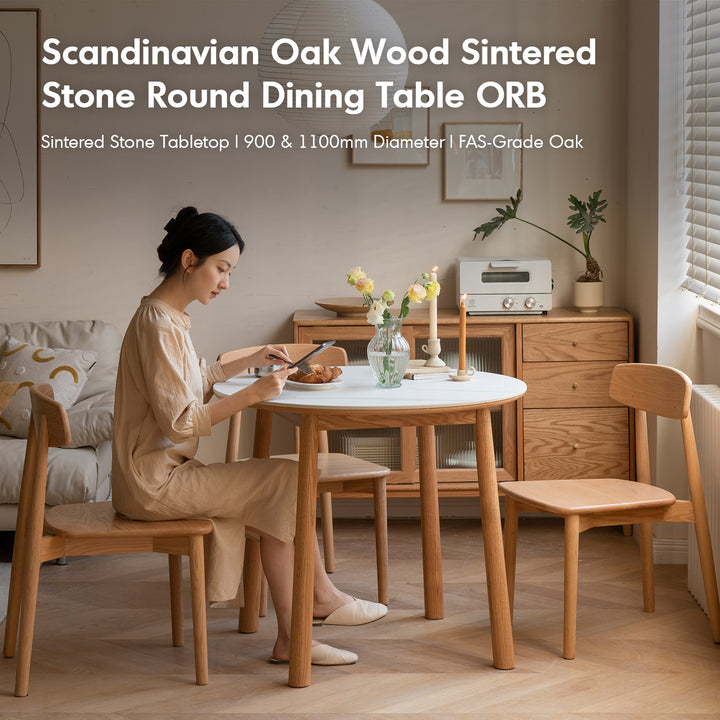 Scandinavian oak wood sintered stone round dining table orb material variants.