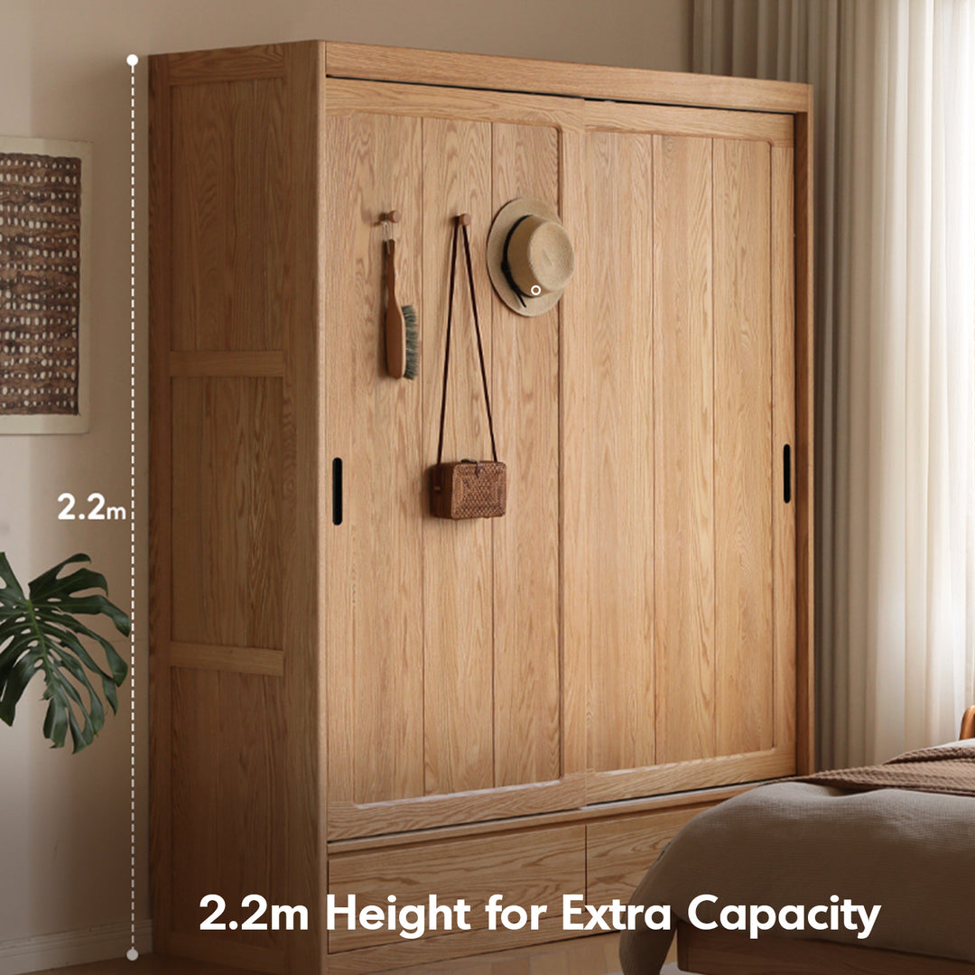 Scandinavian oak wood sliding door wardrobe align in close up details.