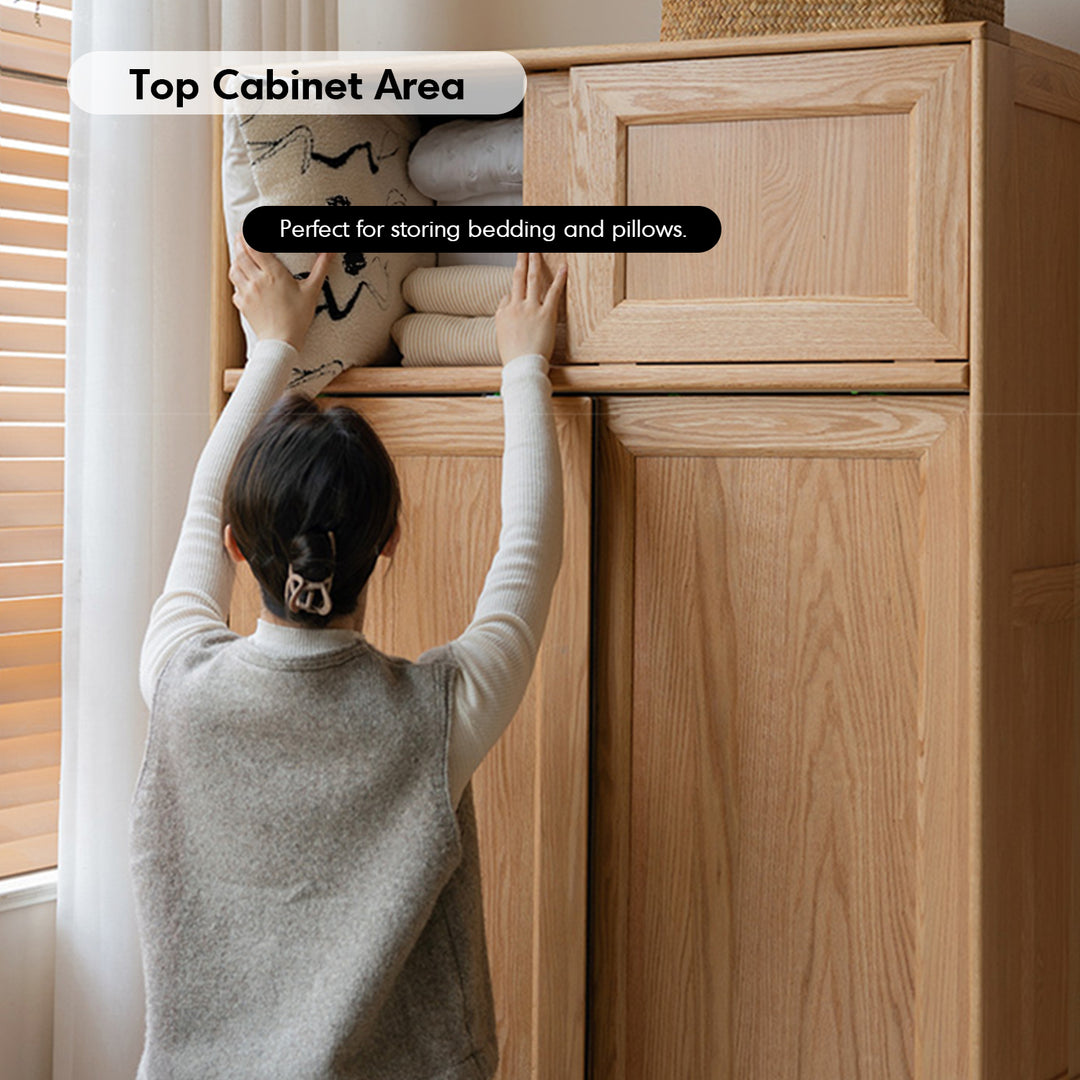 Scandinavian oak wood sliding door wardrobe edge in close up details.