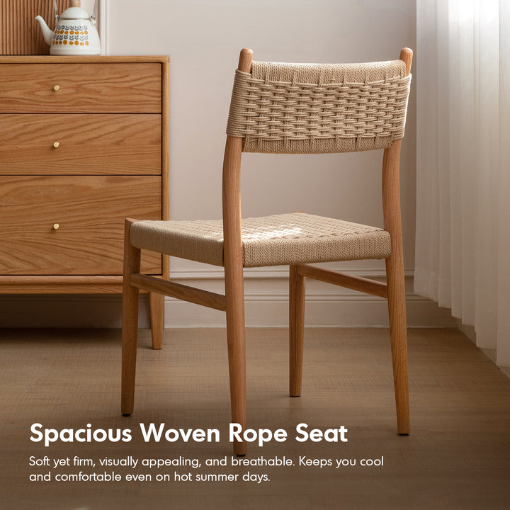 Scandinavian oak wood woven dining chair weave with context.