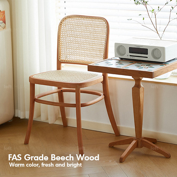 Scandinavian rattan cherry wood dining chair george in real life style.