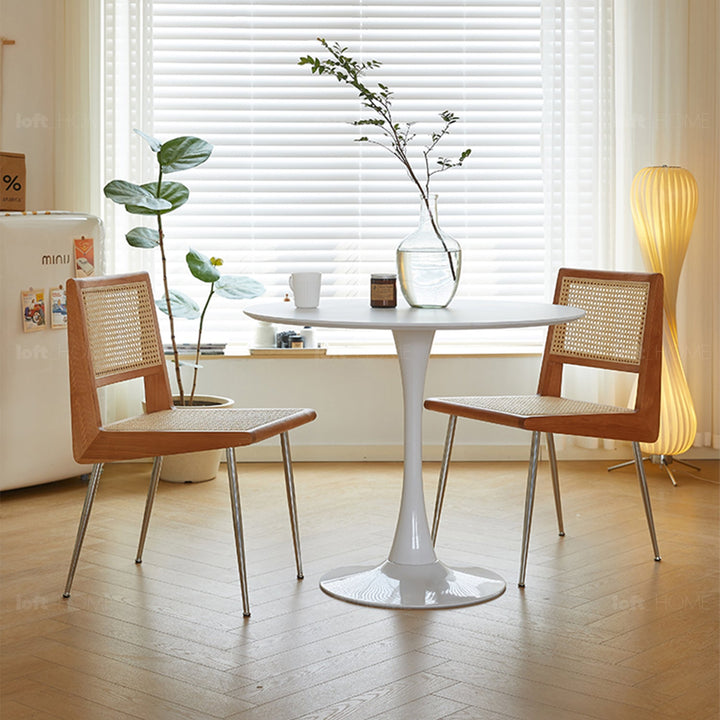 Scandinavian rattan cherry wood dining chair prime layered structure.