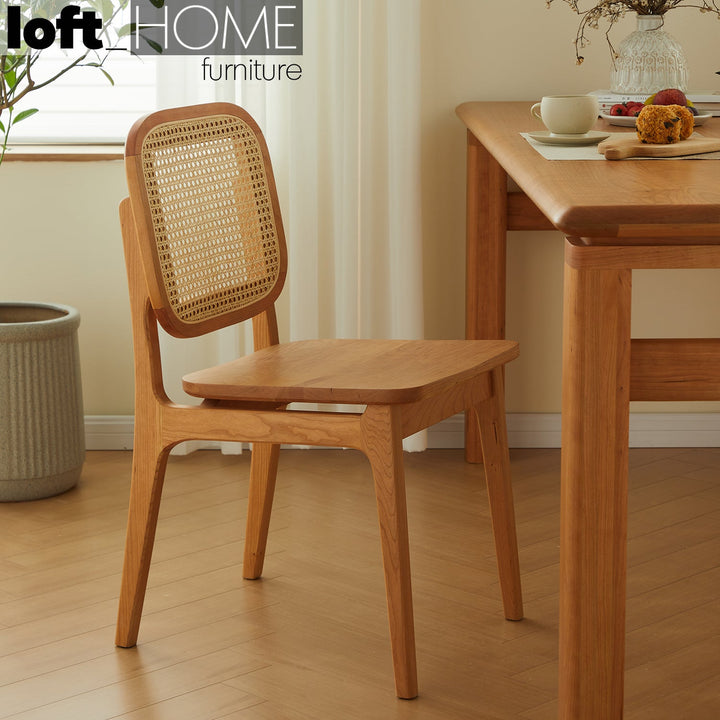 Scandinavian rattan cherry wood dining chair sor primary product view.