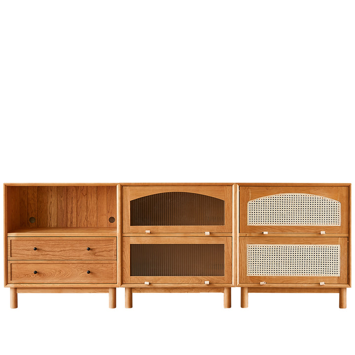 Scandinavian rattan cherry wood modular drawer cabinet stacko in white background.