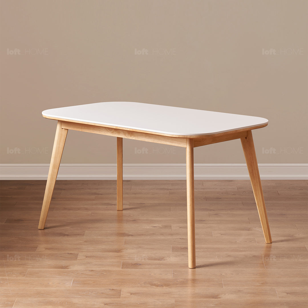 Scandinavian rubber wood sintered stone dining table terra with context.