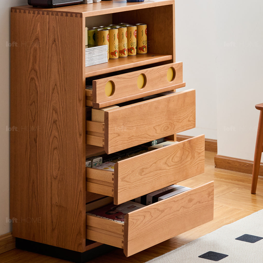 Scandinavian cherry wood chest of drawers timeless 5 in still life.