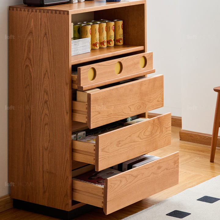Scandinavian cherry wood chest of drawers timeless 5 in still life.