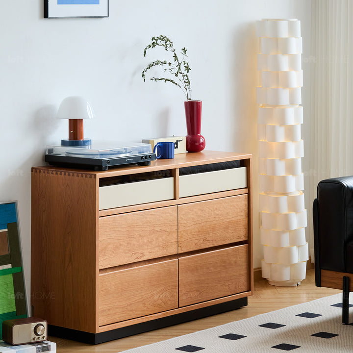 Scandinavian cherry wood chest of drawers timeless 6 in still life.